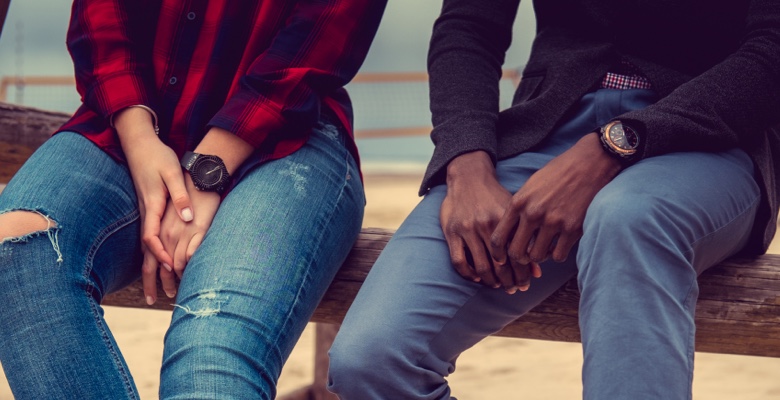 Man and woman wearing dress watches to compliment their casual styling