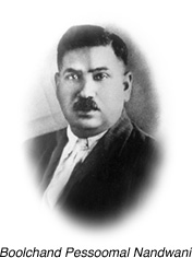 Black and white portrait image of mr. Boolchand Pessoomal Nandwani