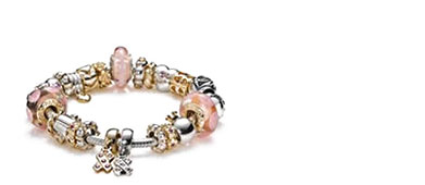 Pandora bracelet with gold and rose gold charms
